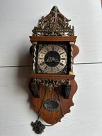 Zaanse klok, Ophalen