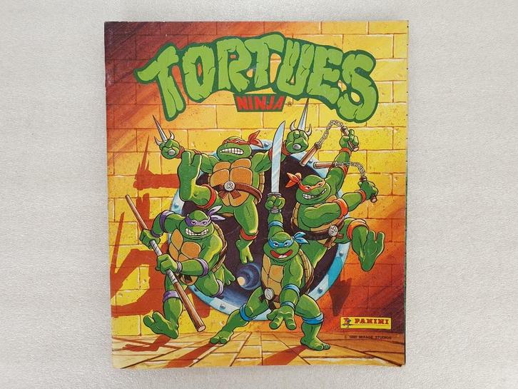 Panini: stickeralbum Tortues Ninja (Panini, Mirage, 1990), Verzamelen, Stickers, Gebruikt, Film, Tv of Omroep, Ophalen of Verzenden