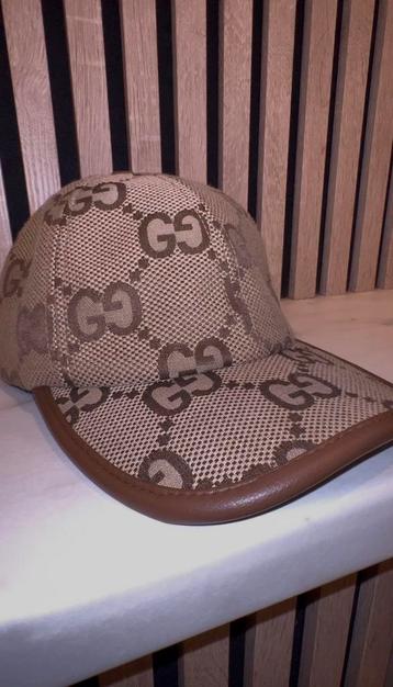 Gucci pet bruin beschikbaar voor biedingen