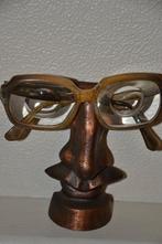 Vintage brillenneus, Ophalen