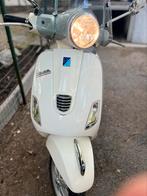 Piaggio Vespa LX 125 3v eerst gebruik in 2013 met 27460km, Fietsen en Brommers, Ophalen, Zo goed als nieuw, Vespa LX