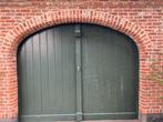 Houten poort Castrol
