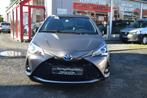 TOYOTA YARIS 1.5 HSD LOUNGE + WAARBORG, Auto's, Toyota, 91 g/km, 4 cilinders, Bruin, Leder en Stof