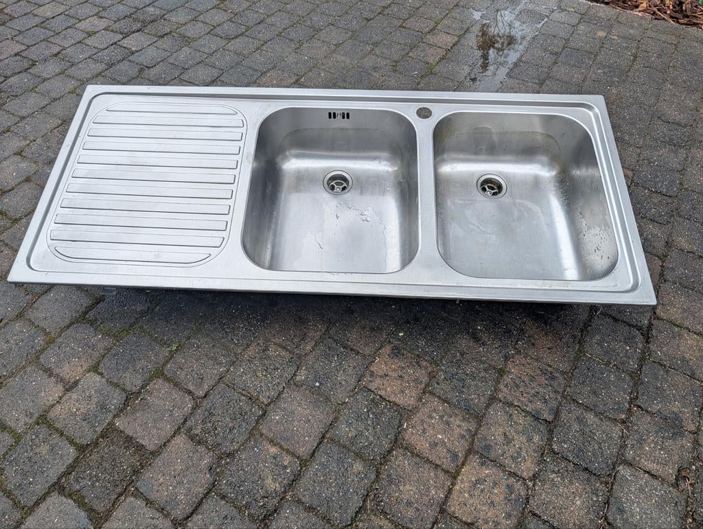 RVS dubbele spoelbak, Ophalen