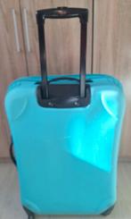 Licht blauwe reiskoffer, Ophalen, Wieltjes