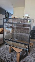 Op maat gemaakt terrarium, Ophalen