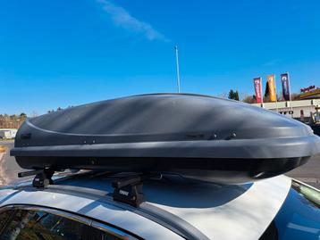 Dakkoffer met wingbars te huur, Enlèvement