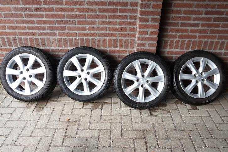 16 inch alu. velgen (4x100) + Bridgestone banden, 185/55-16, Autos : Pièces & Accessoires, Pneus & Jantes, Pneus et Jantes, Pneus été