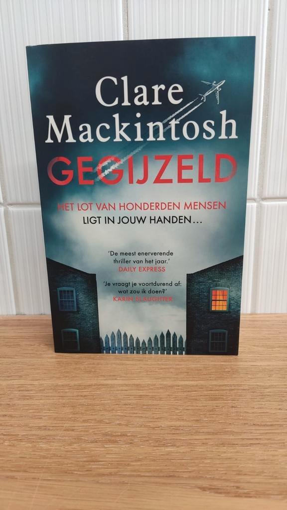 Boek te koop: Clare Mackintosh - Gegijzeld, Boeken, Thrillers, Zo goed als nieuw, Europa overig, Ophalen of Verzenden