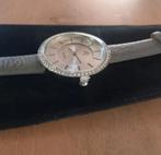 Nieuwe zilverkleurige horloge met Swarovski steentjes, Handtassen en Accessoires, Horloges | Dames, Ophalen of Verzenden, Nieuw