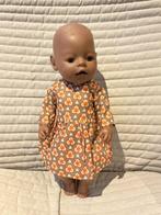 340. Babyborn: Nieuw bruin jurkje met oranje bloemen, Kinderen en Baby's, Speelgoed | Poppen, Ophalen of Verzenden, Nieuw, Babypop