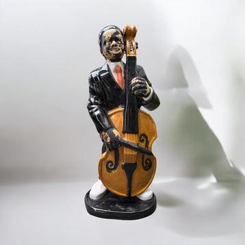 Retro Vintage Beeld Muzikant met Contrabas beschikbaar voor biedingen