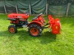 tractor Kubota type 6001 met frees, Ophalen