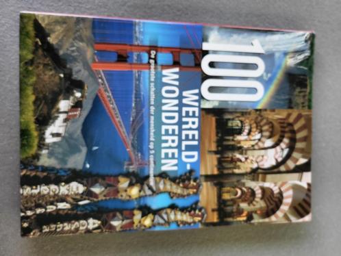 Boek - 100 wereldwonderen, Boeken, Reisgidsen, Zo goed als nieuw, Reisgids of -boek, Ophalen of Verzenden