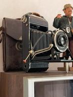 Oude Zeiss Ikon Compur-camera met hoesje, Ophalen