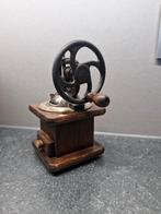 Oud klein zeldzaam koffiemolentje met zijwiel, Enlèvement