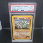 Brock's Rhyhorn 1st Edition Gym Heroes PSA 8, Ophalen of Verzenden, Zo goed als nieuw