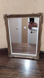 spiegel met gouden frame, Ophalen