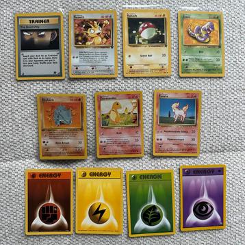 Pokemon wotc 1999 vintage base jungle team rocket beschikbaar voor biedingen