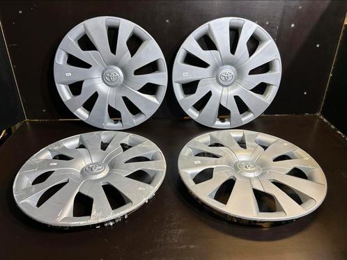 4 wieldoppen Toyota yaris aygo corolla verso 15", Auto diversen, Wieldoppen, Gebruikt, Ophalen of Verzenden