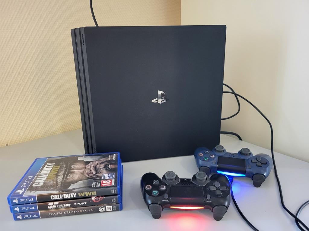 PS4 Pro bundel met 2 controllers & 3 games, Consoles de jeu & Jeux vidéo, Consoles de jeu | Sony PlayStation 4, Enlèvement, Avec 2 manettes