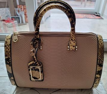 Beige handtas beschikbaar voor biedingen