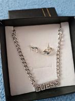 hals ketting guess, Enlèvement