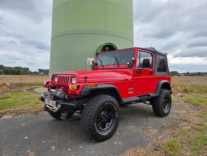 JEEP WRANGLER 4.0HO 1995 - OLDTIMER - ORIGINEEL - WEINIG KM, Auto's, Jeep, Particulier, Wrangler, 4x4, Bluetooth, Lederen bekleding