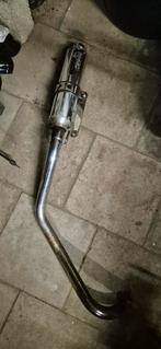 Dax uitlaat, Enlèvement, Pot d'échappement