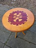 Ronde salontafel, Ophalen