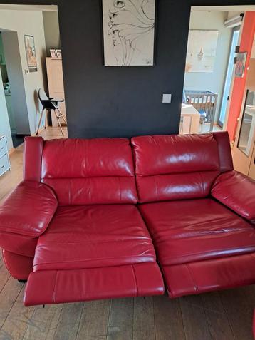 Divan relax cuir rouge, Enlèvement