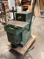 Langgatboormachine met boren, Ophalen