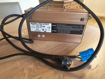 Acculader voor elektrische brommer  beschikbaar voor biedingen