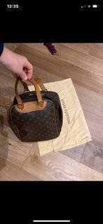 Louis Vuitton vintage excursietas, Zo goed als nieuw