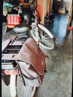 Electrische Minerva damesfiets, Ophalen