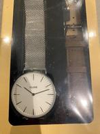 Montre Cluse argentée avec deuxième bracelet en cuir, Handtassen en Accessoires, Horloges | Dames, Nieuw, Overige merken, Zilver