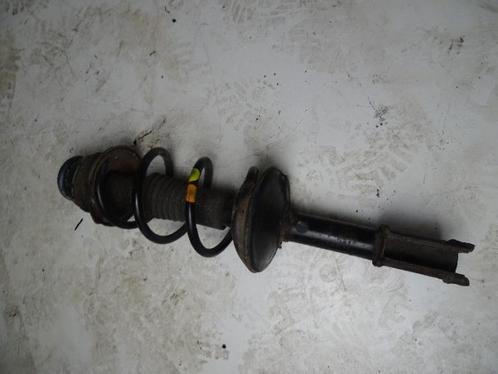 Schokdemper links-voor van een Dacia Logan, Auto-onderdelen, Ophanging en Onderstel, Dacia, Gebruikt, 3 maanden garantie, Ophalen of Verzenden