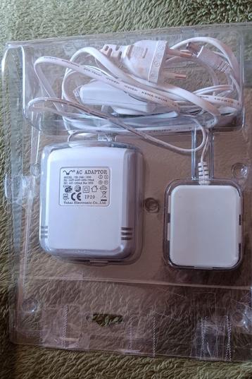 AC Adaptor met 5 uitgangen. beschikbaar voor biedingen