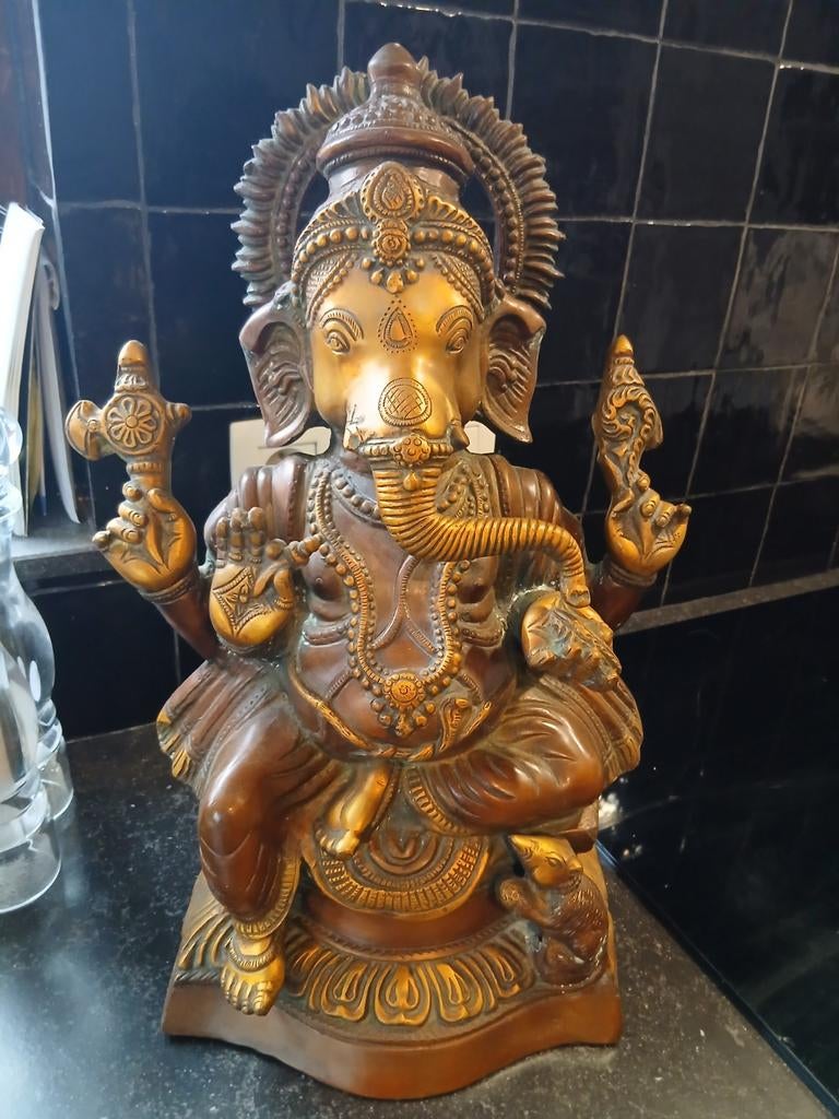 Ganesha bronzen beeld, Ophalen