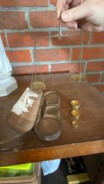 Apothekers weegschaal, Ophalen