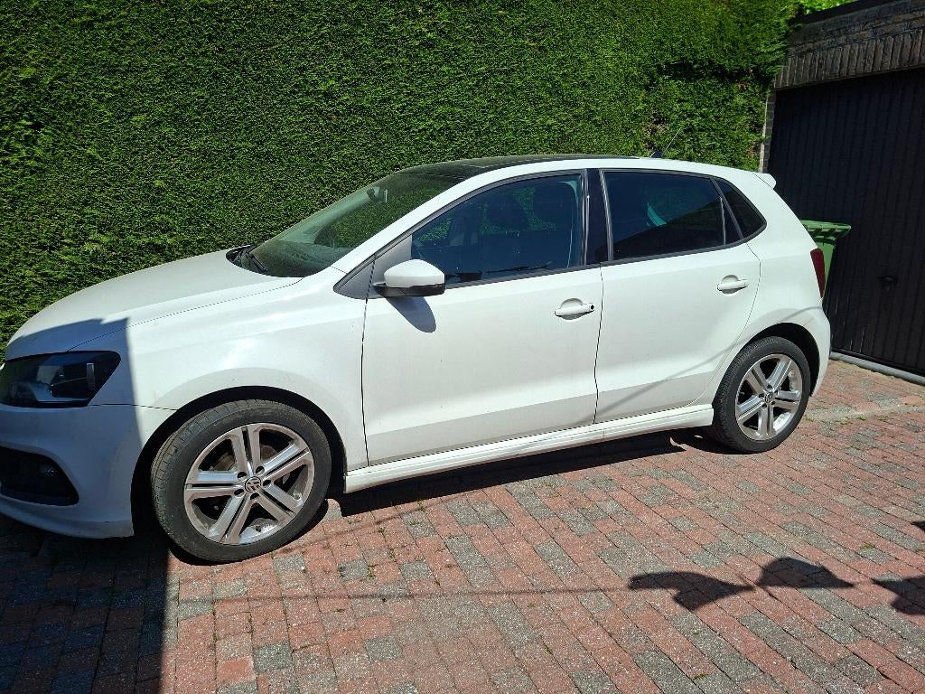 VW Polo te koop, bouwjaar 2013, 135.000 km, Auto's, Voorwielaandrijving, Stof, Zwart, Wit