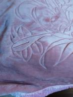 Een  bed deken, Ophalen