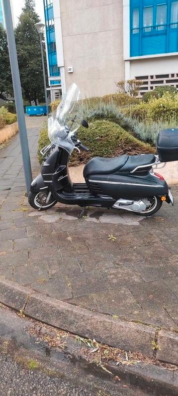 Scooter 125 Peugeot Django