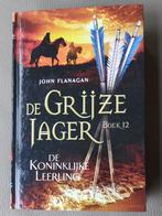 De Grijze Jager boek 12 'De Koninklijke Leerling' - John Fla, Ophalen of Verzenden, Zo goed als nieuw, John Flanagan