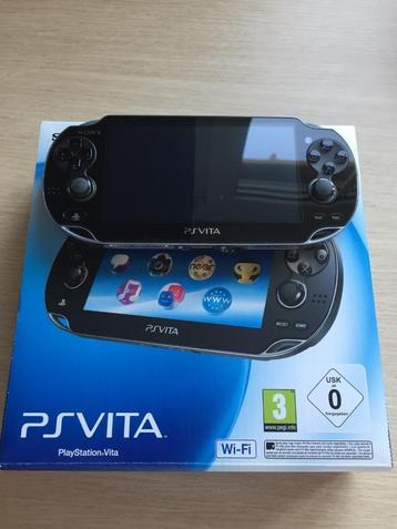 PS Vita OLED + 16GB geheugenkaart + 2 games + accessoires beschikbaar voor biedingen