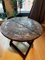 Opvouwbare salontafel, Ophalen