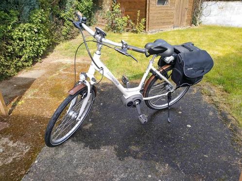 A vendre vélo électrique WINORA comme neuf, Fietsen en Brommers, Elektrische fietsen, Zo goed als nieuw, 30 tot 50 km per accu