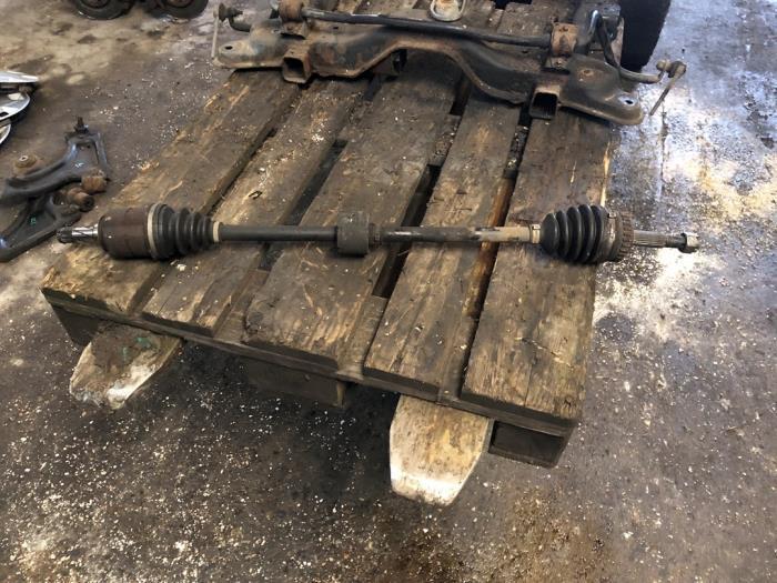 Aandrijfas rechts-voor van een Opel Corsa, Auto-onderdelen, Remmen en Aandrijving, Opel, Gebruikt, 3 maanden garantie, Ophalen of Verzenden