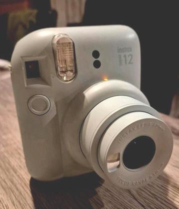 Mini Polaroid Instax + 10 photos, Enlèvement, Comme neuf, Autres Marques, Moins de 4 fois
