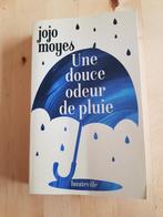 Une douce odeur de pluie -  Jojo Moyes, Livres, Comme neuf, Enlèvement ou Envoi